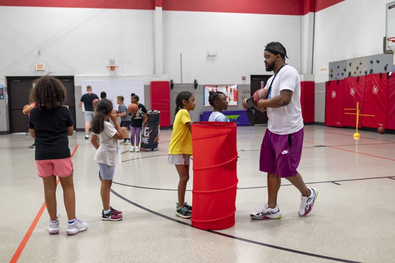 Coach O instructing athletes
